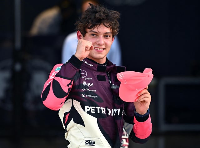 Andrea Kimi Antonelli celebrates recording the fastest time in sprint qualifying.