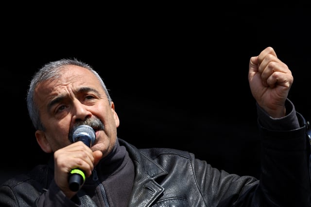 Green Left Party's candidate for parliament Sirri Sureyya Onder speaks to supporters during a rally ahead of the May 14 presidential and parliamentary elections, in Istanbul, Turkey May 13, 2023. REUTERS/Hannah McKay/File Photo