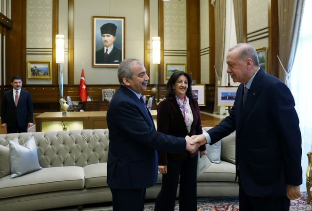 Onder met Turkish President Recep Tayyip Erdogan just days before he collapsed