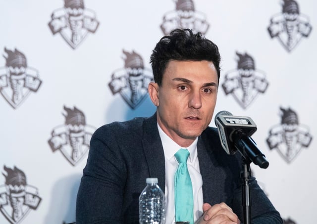 In this Jan. 8, 2020, photo, New York Liberty&#39;s general manager Jonathan Kolb speaks to reporters during a news conference at Barclays Center in New York. Kolb knew that he and first-year coach Walt Hopkins would have to make some tough decisions on the team&#39;s roster this year. He just didn&#39;t think they&#39;d have to do it so quickly and without seeing players compete on the court in training camp. The WNBA and the players&#39; union decided that teams would have to get their rosters under the salary cap by Tuesday, May 26, so that the players could start getting paid on June 1. (AP Photo/Mary Altaffer)