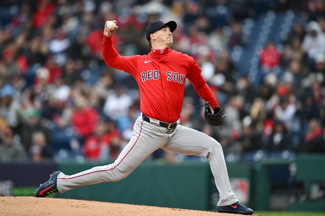 CLEVELAND, OHIO - APRIL 26: Walker Buehler #0 of the Boston Red Sox throws a pitch during the first inning of game two of a doubleheader against the Cleveland Guardians at Progressive Field on April 26, 2025 in Cleveland, Ohio.
