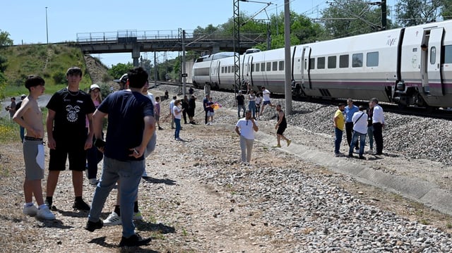 Passengers were forced to disembark a high-speed electric train near Cordoba on April 28 when Spain was crippled by massive power cuts