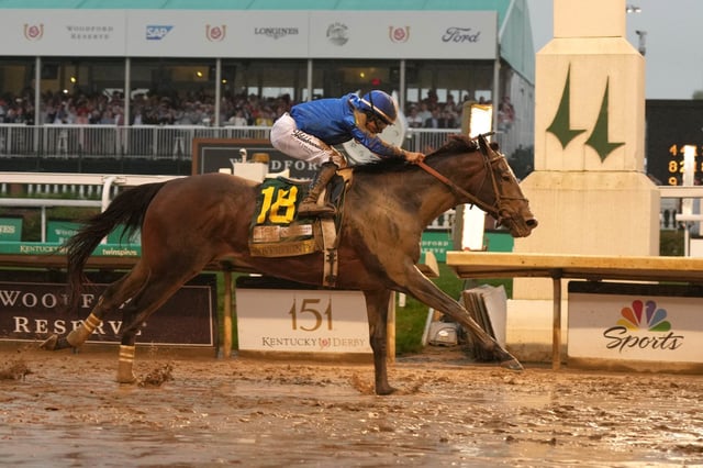 LOUISVILLE, KENTUCKY - MAY 03: Sovereignty #18, ridden by jockey Junior Alvarado crosses the finish line to win the 151st running of the Kentucky Derby at Churchill Downs on May 03, 2025 in Louisville, Kentucky. (Photo by Grace Bradley/Getty Images)