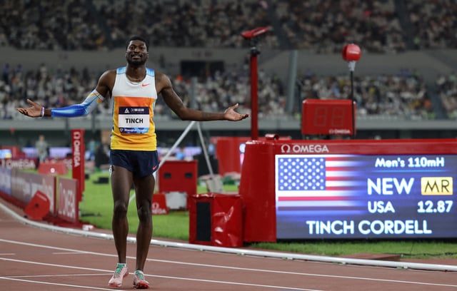 Athletics - Diamond League - Shanghai - Shaoxing China Textile City Sports Centre, Shaoxing, China - May 3, 2025 Cordell Tinch of the U.S. celebrates after winning the men's 110m hurdles REUTERS/Go Nakamura/File Photo