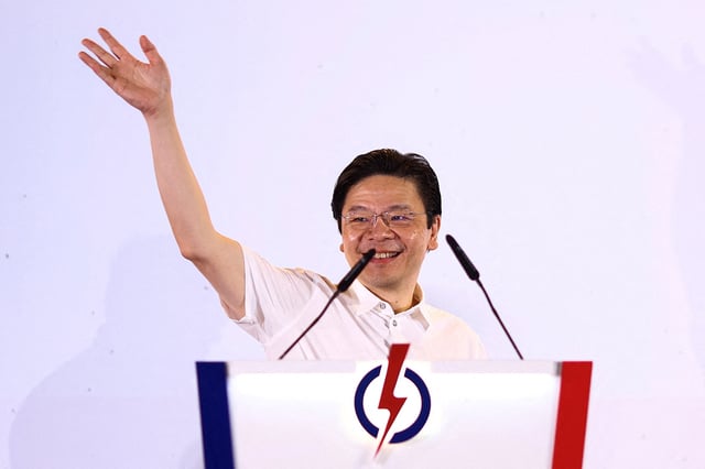 Singapore's Prime Minister Lawrence Wong addresses People's Action Party (PAP) supporters, at an assembly area for the results of the general election, in Singapore, May 4, 2025. REUTERS/Edgar Su