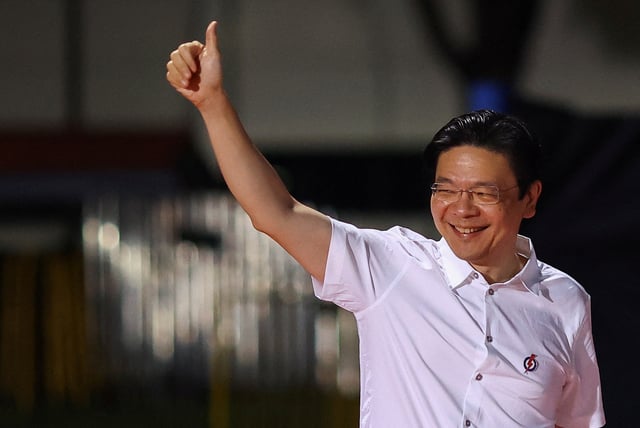 Singapore's Prime Minister Lawrence Wong arrives at an assembly area for People's Action Party supporters, on the day of the general election in Singapore, May 3, 2025. REUTERS/Edgar Su