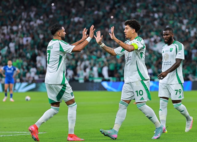 Soccer Football - Asian Champions League - Semi Final - Al Hilal v Al Ahli - King Abdullah Sports City, Jeddah, Saudi Arabia - April 29, 2025 Al Ahli's Roberto Firmino celebrates scoring their first goal with Riyad Mahrez REUTERS/Stringer/File Photo