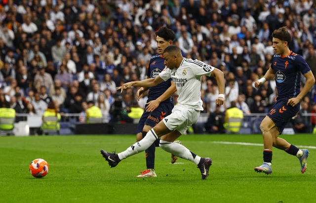 Soccer Football - LaLiga - Real Madrid v Celta Vigo - Santiago Bernabeu, Madrid, Spain - May 4, 2025 Real Madrid's Kylian Mbappe scores their third goal REUTERS/Susana Vera
