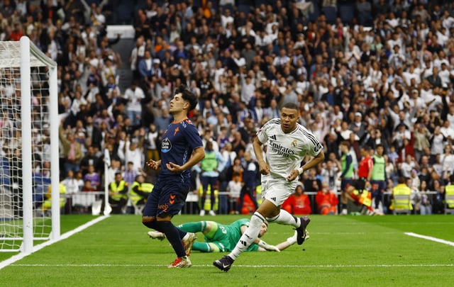 Soccer Football - LaLiga - Real Madrid v Celta Vigo - Santiago Bernabeu, Madrid, Spain - May 4, 2025 Real Madrid's Kylian Mbappe celebrates scoring their third goal REUTERS/Susana Vera