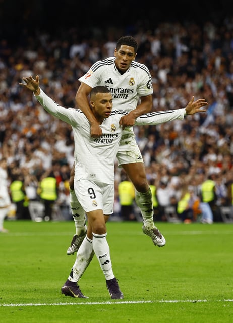 Soccer Football - LaLiga - Real Madrid v Celta Vigo - Santiago Bernabeu, Madrid, Spain - May 4, 2025 Real Madrid's Kylian Mbappe celebrates scoring their second goal with Real Madrid's Jude Bellingham REUTERS/Susana Vera