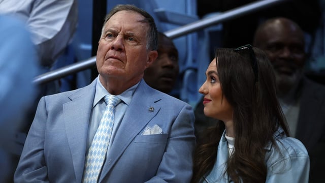 Bill Belichick and his girlfriend, Jordon Hudson, are under fire after a CBS interview. The controversy escalated with a Saturday Night Live skit mocking their age difference.
Jared C. Tilton/Getty Images/AFP (Photo by Jared C. Tilton / GETTY IMAGES NORTH AMERICA / Getty Images via AFP)
