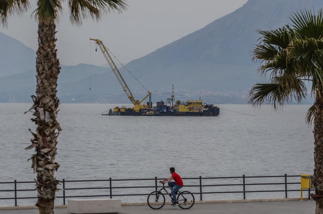 The multi-purpose floating work barge Hebo Lift 2 monitors the stretch of sea off Porticello, near Palermo, Sicily, Italy, Sunday, May 4, 2025, where the British superyacht Bayesian sunk on August 19, 2024 as the operations for its recovery start. (AP Photo/Salvatore Cavalli)