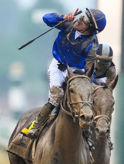 Jockey Junior Alvarado celebrates as he and Sovereignty win the 2025 Kentucky Derby at Churchill Downs in Louisville, Kentucky.