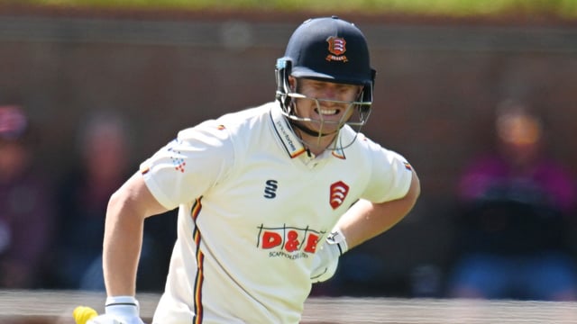 Cox holds his side after running a single that took him to 99 for Essex against Somerset