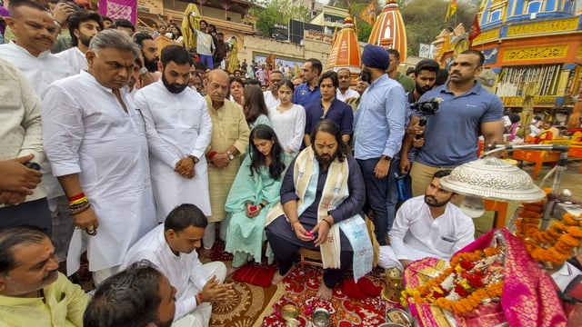 Anant Ambani, son of businessman Mukesh Ambani, with wife Radhika Merchant performing 'puja' at Har Ki Pauri, in Haridwar on Sunday.