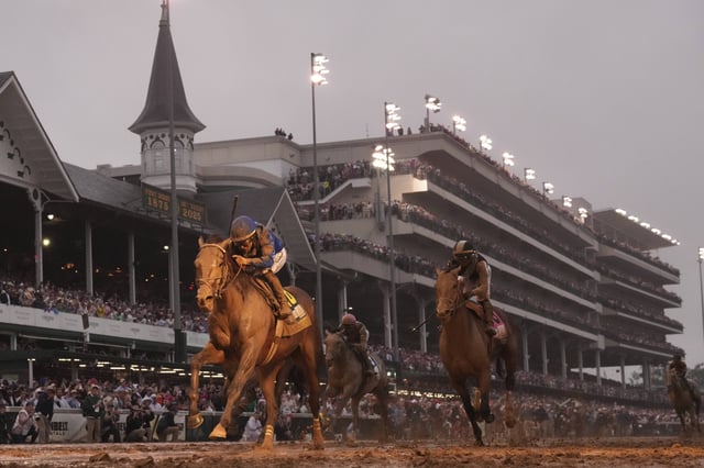 Sovereignty, ridden by Junior Alvarado, left, crosses the finish line to win the 151st running of the Kentucky Derby horse race at Churchill Downs Saturday, May 3, 2025, in Louisville, Kentucky.