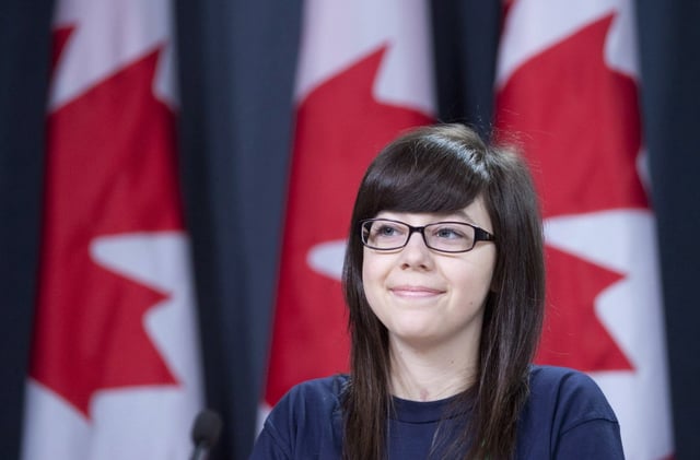 Helene Campbell, double-lung transplant recipient, smiles during a news conference in Ottawa on Tuesday September 18, 2012. THE CANADIAN PRESS/Adrian Wyld