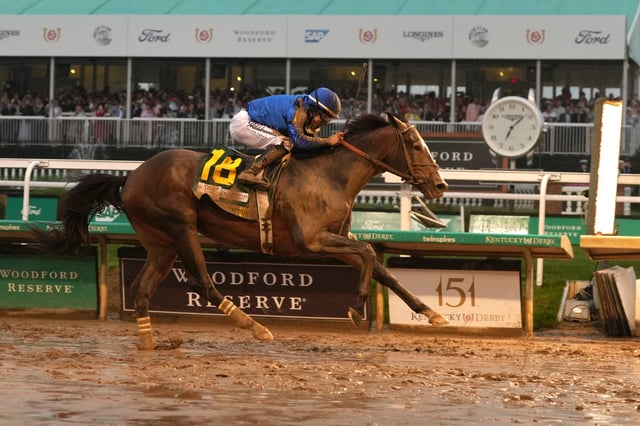 LOUISVILLE, KENTUCKY - MAY 03: Sovereignty #18, ridden by jockey Junior Alvarado crosses the finish line to win the 151st running of the Kentucky Derby at Churchill Downs on May 03, 2025 in Louisville, Kentucky.