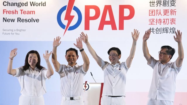 The ruling People’s Action Party, led by Lawrence Wong, second right, increased its share of the vote