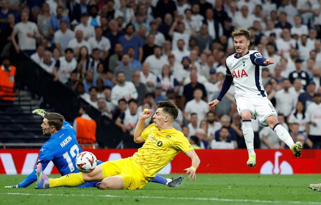 Soccer Football - Europa League - Semi Final - First Leg - Tottenham Hotspur v Bodo/Glimt - Tottenham Hotspur Stadium, London, Britain - May 1, 2025 Tottenham Hotspur's James Maddison scores their second goal past Bodo/Glimt's Nikita Haikin Action Images via Reuters/Peter Cziborra/File Photo