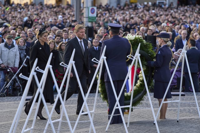 Dutch King Willem-Alexander and Queen Maxima lay a wreath during a solemn annual national service to commemorate the war dead in Amsterdam, Netherlands, Sunday, May 4, 2025. (AP Photo/Peter Dejong)