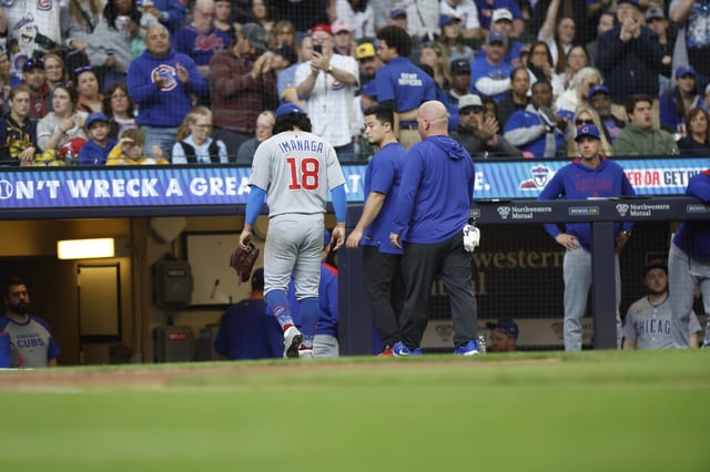 MILWAUKEE, WISCONSIN – MAY 04: Shota Imanaga #18 of the Chicago Cubs injures his left leg in the sixth inning while covering first base on a double play attempt against the Milwaukee Brewers at American Family Field on May 04, 2025 in Milwaukee, Wisconsin. (Photo by John Fisher/Getty Images)