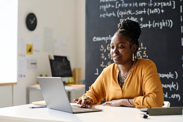 Teacher working at her desk