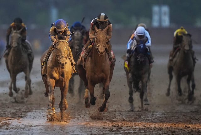 Jockey Junior Alvarado and Sovereignty were bathed in the finish line light as they won the 2025 Kentucky Derby Saturday, May 3, 2025 at Churchill Downs in Louisville, Kentucky. © Matt Stone/Courier Journal / USA TODAY NETWORK via Imagn Images