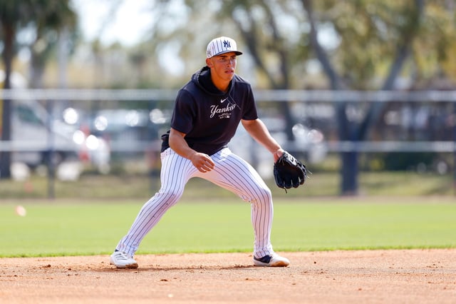 TAMPA, FLORIDA - MARCH 1: George Lombard Jr. #96 of the New York Yankees participates in a fielding drill prior to a spring training game against the Houston Astros at George M. Steinbrenner Field on March 1, 2025 in Tampa, Florida.