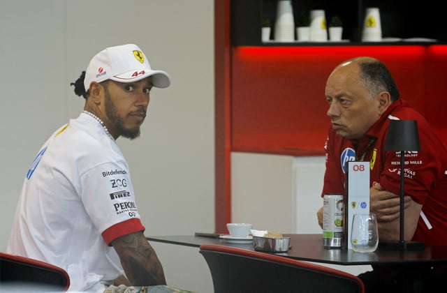 Formula One F1 - Miami Grand Prix - Miami International Autodrome, Miami, Florida, United States - May 4, 2025 Ferrari's Lewis Hamilton and Ferrari team principal Frederic Vasseur ahead of the race REUTERS/Brian Snyder