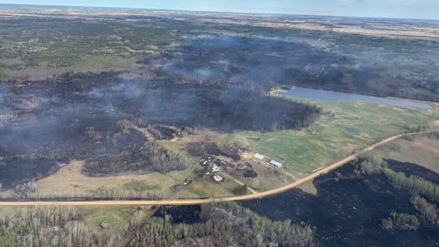 As of midnight Sunday, a wildfire in Sturgeon County, northeast of Edmonton, had burned down one home.