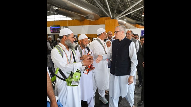 Jammu and Kashmir chief minister Omar Abdullah with Hajj pilgrims at Sheikh-ul-Alam International Airport in Srinagar on Sunday. (Photo: X)