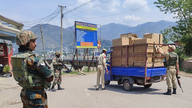 Jammu and Kashmir: An army personnel patrols a road in Poonch.