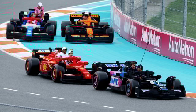 Formula One F1 - Miami Grand Prix - Miami International Autodrome, Miami, Florida, United States - May 4, 2025 Alpine's Pierre Gasly and Jack Doohan alongside Ferrari's Charles Leclerc and Lewis Hamiltonin in full size Lego replica F1 car during the drivers parade REUTERS/Ricardo Arduengo