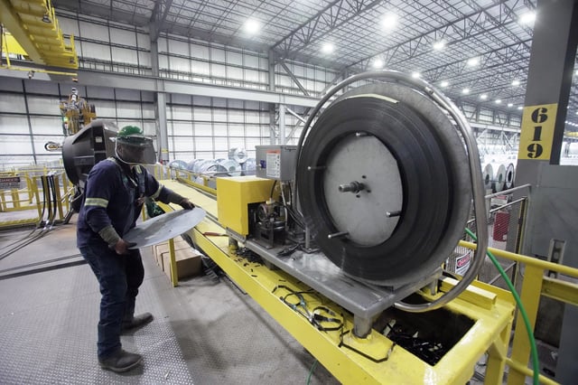 An employee works inside a Nucor steel factory in Blytheville, Arkansas, U.S., March 28, 2025.  REUTERS/Karen Pulfer Focht/File photo
