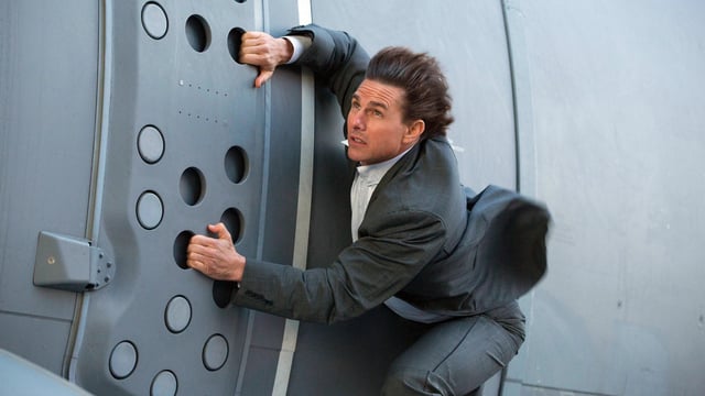 Tom Cruise held onto the side of an aeroplane in Mission: Impossible—Rogue Nation.