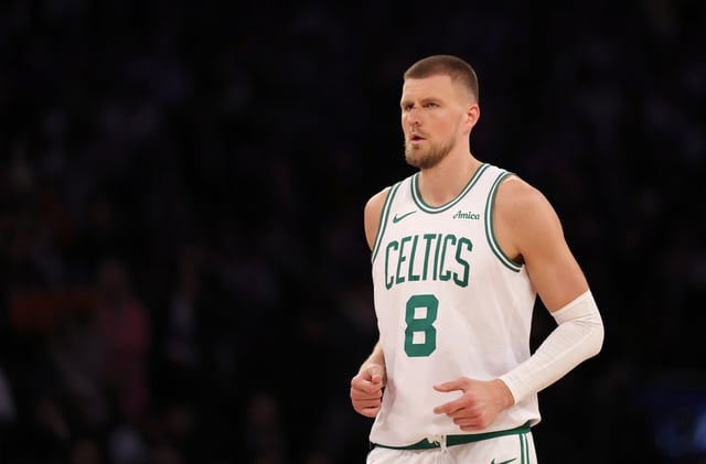 NEW YORK, NEW YORK - APRIL 08: Kristaps Porzingis #8 of the Boston Celtics reacts in the second half against the New York Knicks at Madison Square Garden on April 08, 2025 in New York City. The Boston Celtics defeated the New York Knicks 119-117 in overtime. NOTE TO USER: User expressly acknowledges and agrees that, by downloading and or using this photograph, User is consenting to the terms and conditions of the Getty Images License Agreement. (Photo by Elsa/Getty Images)