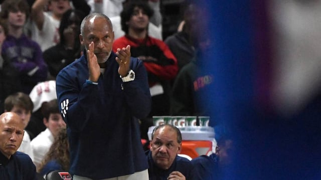 Kansas’ assistant coach Norm Roberts coaches after head coach Bill Self is ejected from the Texas Tech during a Big 12 basketball game, Monday, Feb. 12, 2024, at United Supermarkets Arena.