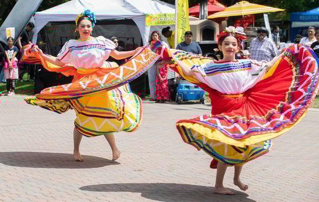 Natalie Beltran, 16, left and sister Analie Beltran, 11, with the Ballet Folklorico Los Mirasoles perform a traditional Mexican dance at El Concilio’s annual Cinco De Mayo Festival at the Weber Point Events Center in downtown Stockton on May 5, 2024.