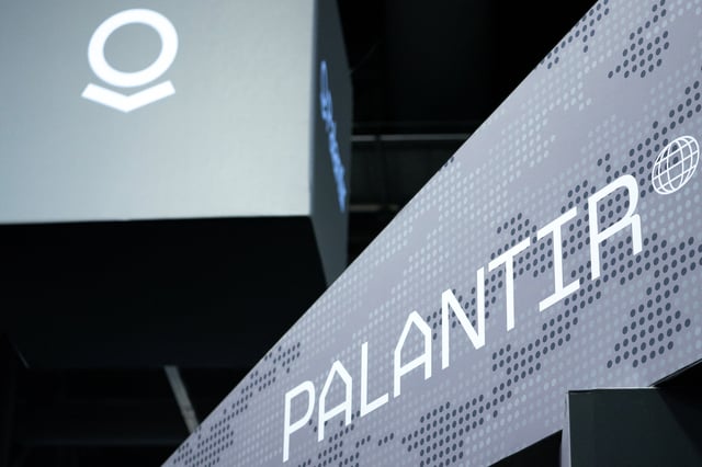 Signage for Palantir is seen during the Association of the United States Army annual meeting and exposition at the Walter E. Washington Convention Center in Washington, U.S., October 14, 2024. REUTERS/Nathan Howard/File Photo