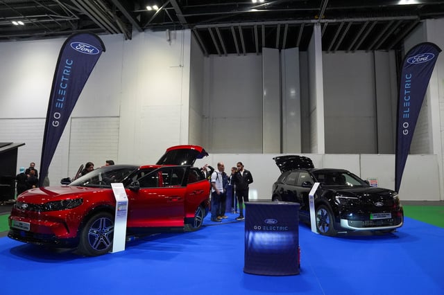 Ford electric cars are being exhibited at the Everything Electric, the Home Energy & Electric Vehicle Show, in London, Britain, April 16, 2025. REUTERS/Maja Smiejkowska/File Photo