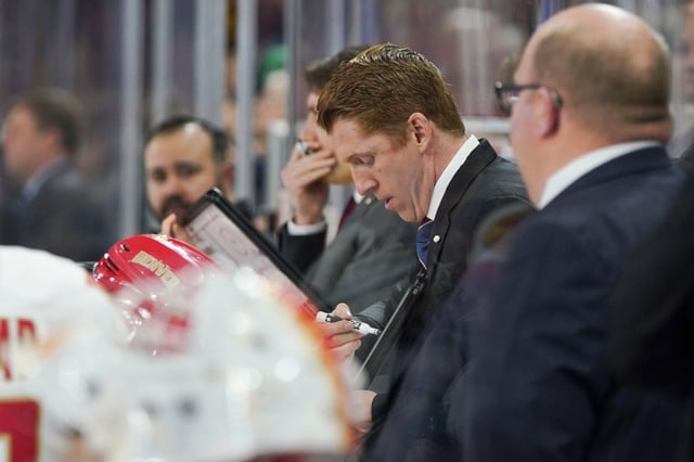 University of Denver&#39;s head coach David Carle talks to the team during a break in the third period at The University of Denver’s Magness Arena, Friday, Feb. 14, 2025, in Denver. University of Denver won the game 4-0 against University of North Dakota. (Rebecca Slezak/Special to The Denver Post).
