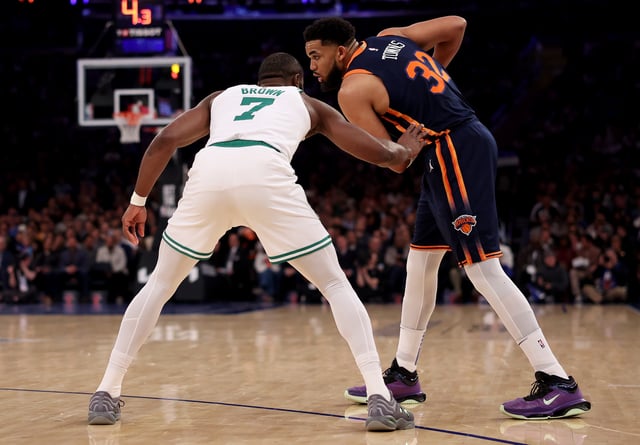 Jaylen Brown (left) and the Celtics are heavy favorites in Game 1 of their Eastern Conference second-round matchup with Karl-Anthony Towns and the Knicks.