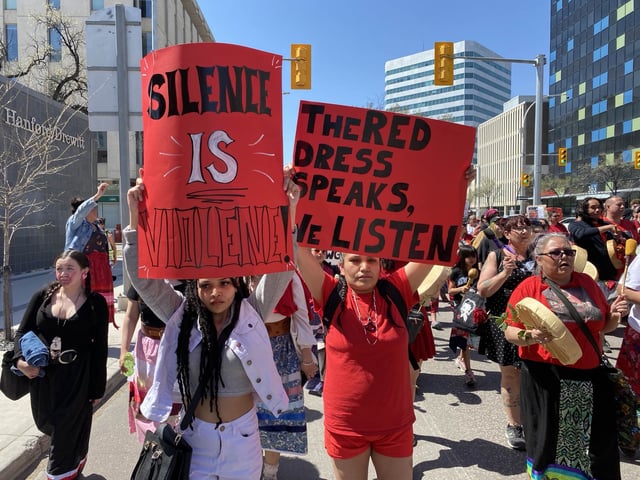 Red Dress Day marchers in downtown Winnipeg May 5, 2025. 