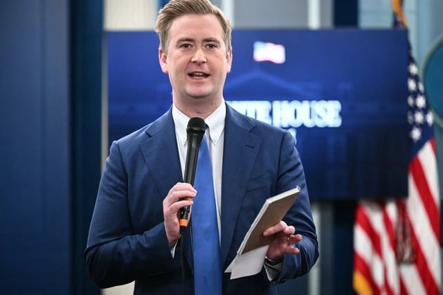 Fox News broadcast journalist Peter Doocy works before White House Press Secretary Karoline Leavitt arrives for the daily briefing in the Brady Briefing Room of the White House in Washington, DC, on March 11, 2025. (Photo by MANDEL NGAN/AFP via Getty Images)