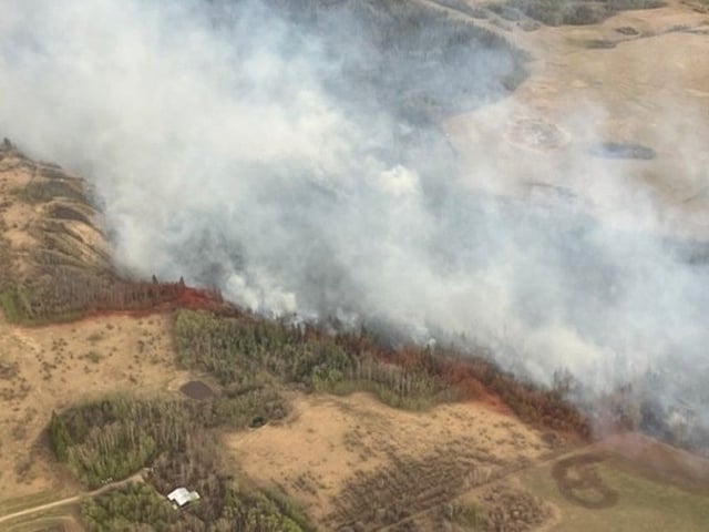 A wildfire, which was discovered on May 1, 2025, burns just outside of Fort St. John.