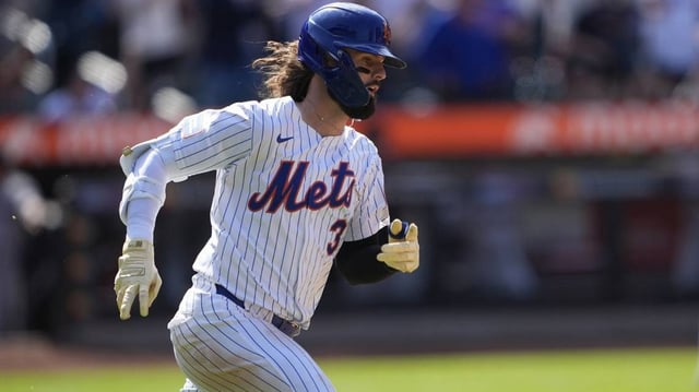 May 1, 2025; New York City, New York, USA; New York Mets designated hitter Jesse Winker (3) runs out a double against the Arizona Diamondbacks during the eighth inning at Citi Field. Mandatory Credit: Gregory Fisher-Imagn Images