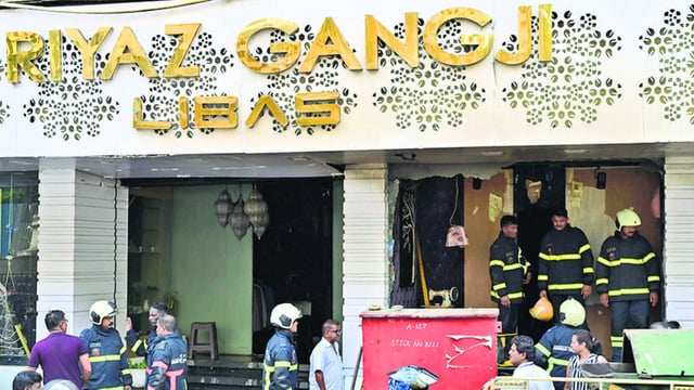 Mumbai, India - May 5, 2025:Fire Brigade officials during cooling operation at Libas- Riyaz Gangji, after it was gutted by fire at Pedder Road, in Mumbai, India, on Monday, May 5, 2025. (Photo by Anshuman Poyrekar/ Hindustan Times) (Hindustan Times)