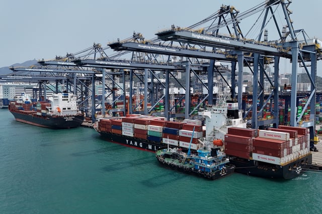 A drone view shows containers at the terminals at the port in Kwai Chung in Hong Kong, China, April 3, 2025. REUTERS/Tyrone Siu/File Photo
