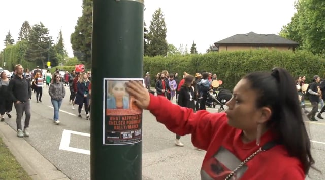 Supporters put up a poster asking what happened to Chelsea Poorman at a march in her honour on Saturday.